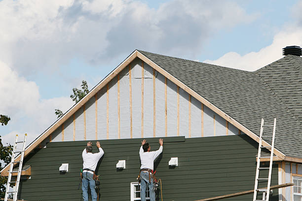 Professional Siding Contractor technician working in Honey Grove, TX